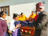 Warm clothes distribution program at Syangja