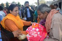 Distributi​ng Blankets to the cold affected peoples