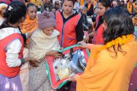 Distributing Necessary Materials to sadhus and batuks 